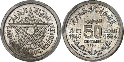 a close up of a coin with a pentagram on it