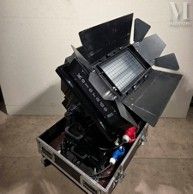 a laptop computer sitting in a case on top of a table