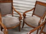 four chairs that are sitting next to each other
