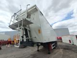 an image of a large white truck parked in a lot