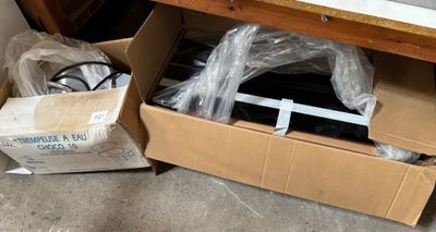 a box that has some items in it on the floor