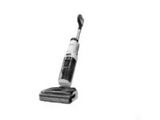 une image représentant une photo en noir et blanc d'un aspirateur