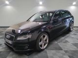 an image of a black audi parked in a garage