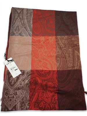 a close up of a blanket with a tag on it