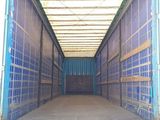 the back of a truck with a flat bed and a flat bed