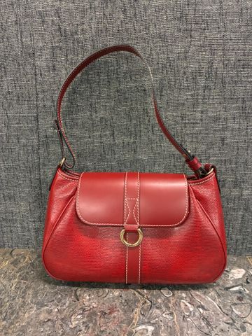 LANCEL – Sac à bandoulière en cuir rouge. État neuf