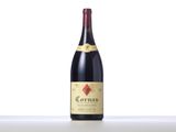 a bottle of red wine sitting on top of a table