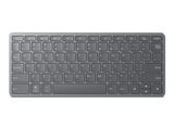 a close up of a keyboard on a white surface