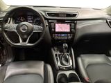 the interior of a car with a steering wheel, dashboard, and dashboard controls