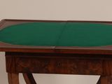 a small table with a green table top on it