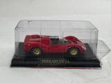 a red toy car in a clear case on a white surface