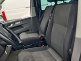 the interior of a truck with two rows of seats and a steering wheel