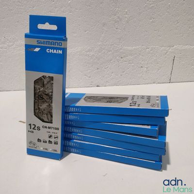 a box of chain on a table next to a box of chain
