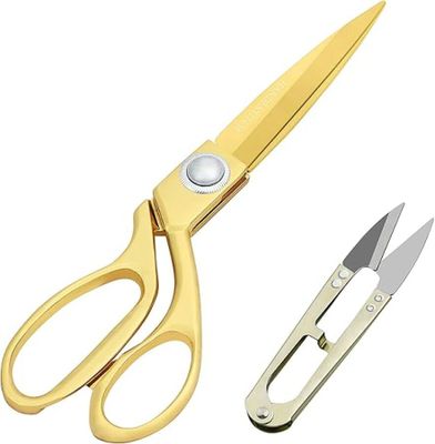 a pair of scissors and a pair of pliers on a white background