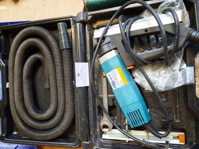 a box with a hose and a blow dryer in it