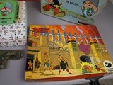 a table with a bunch of cartoon books on top of it