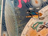 a picture of a map of the world with a man on it