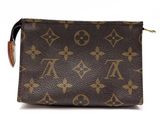 sac de poignet Louis Vuitton en toile Monogram