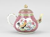an image of a pink teapot with a rooster and flowers on it