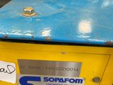 a seal that is sitting on top of a machine