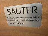 a sign that says sauter on the side of a cabinet