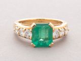 an emerald and diamond ring