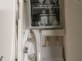 a white box with a charger and a charger in it