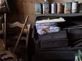 a pile of junk in the corner of a room