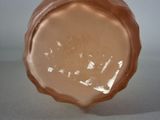 a close up of a glass object on a table