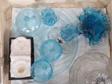 a box with a lot of glass items inside of it