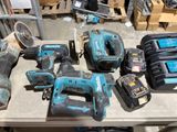 many different tools that are sitting on a table