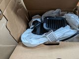 a cardboard box with a blow dryer inside of it