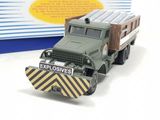 a toy truck that is sitting next to a box