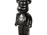 a black bear figurine with a t - shirt on it