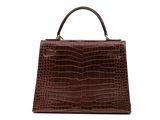 a brown crocodile skin handbag on a white background