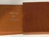 un livre marron avec une couverture marron sur laquelle est inscrit « album de lubrees »