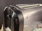 an image of a toaster on a counter top