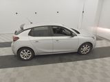 a picture of a white car parked in a garage