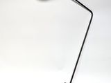 a lamp that is sitting on a table with a cord
