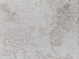 a close up of a dirty carpet with a stain on it
