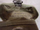 a close up of a purse with a metal clasp on it