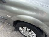 a car that is parked on the side of the road