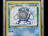a close up of a pokemon card in a plastic case