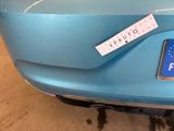 a blue car with a sticker on the back of it
