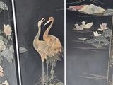 a black screen with a picture of two birds on it