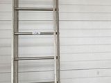 a ladder leaning against a wall in a garage
