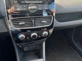 the interior of a car with a dashboard and steering controls