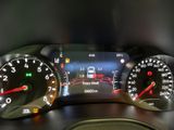 a close up of a car dashboard with a speedometer and gauges