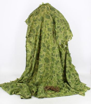 an image of a green dress with a flower pattern on it