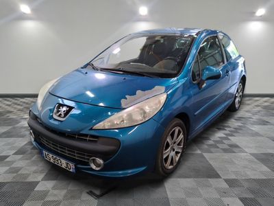 a picture of a blue car parked in a garage